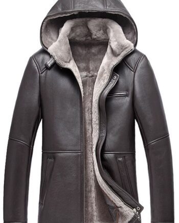 a black shearling sheepskin coat with a hood, a classic collar, and a front button closure. The cuffs of the coat are ribbed.