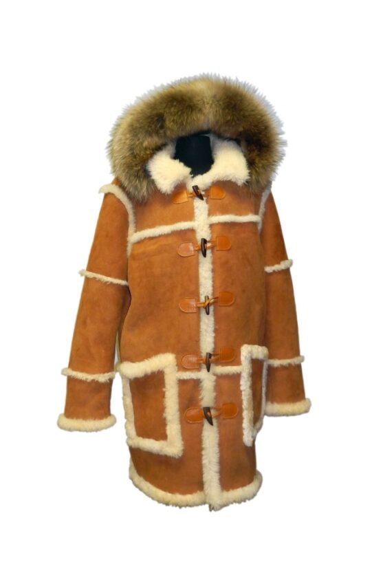 A man wearing a men’s shearling coat hooded with a button closure and two front pockets.