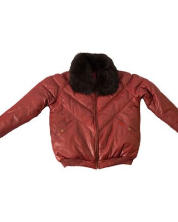 A man wearing a vintage red leather bomber jacket with a fox fur collar and a zipper closure.