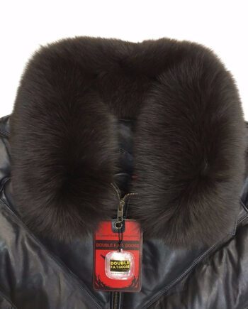 A man wearing a NWT vintage double F.A.T. goose 3/4 black V-bomber jacket from 80s with a detachable real fox fur collar, zippered cuffs, and side pockets
