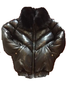 A man wearing a V-Bomber black leather jacket with a detachable real fox fur collar, zippered cuffs, and side pockets