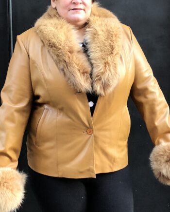 a tan lambskin leather coat with a fox fur collar and a belt