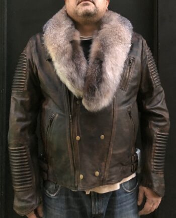 A black waxed biker rib coat with crystal fox fur collar and cuffs
