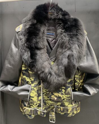 A man wearing a new camel flash biker jacket with black fox fur collar, looking cool and edgy.