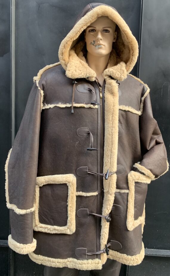 A brown shearling parker with a zippered front, a hood, and two pockets