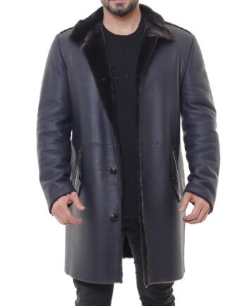A 7/8 length coat made of Spanish Merino shearling sheepskin, with a notched collar, slash pockets, and button closure. The coat is brown and has a smooth and shiny surface.