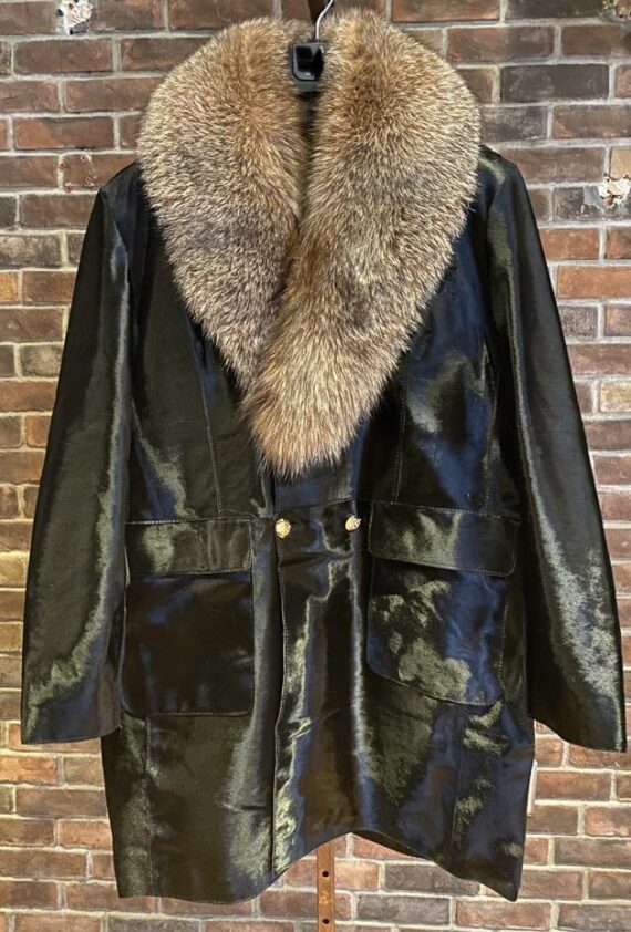 camouflage leather and pony hair coat with a detachable fur collar, four front pockets, and a zipper closure